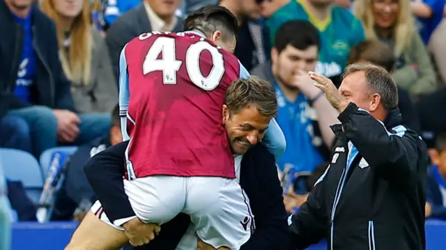 Jack Grealish celebrates with Tim Sherwood