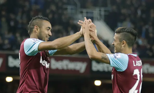 Dimitri Payet and Lanzini celebrate