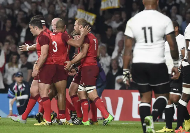 England celebrate scoring their try