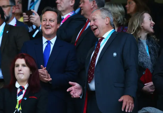 David Cameron alongside Bill Beaumont