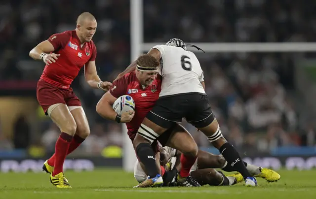 Tom Youngs is tackled by Dominiko Waqaniburotu