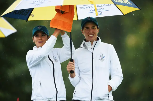 Umbrellas up at the Solheim Cup