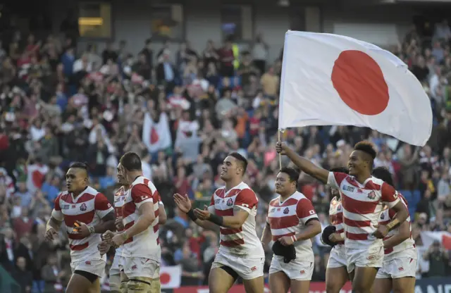 Japan players celebrate