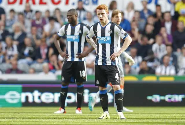 Newcastle players look dejected