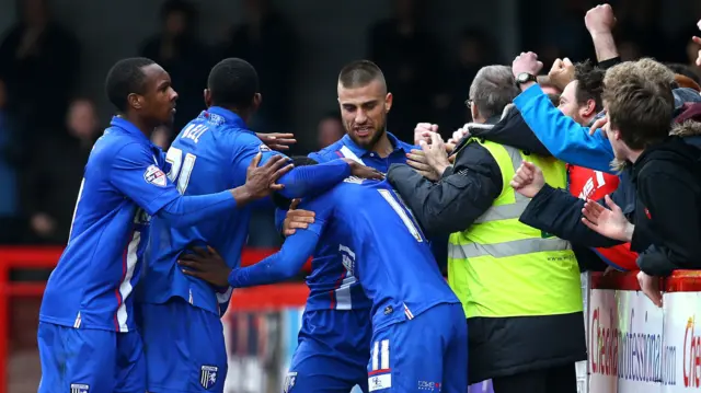 Gillingham players celebrate