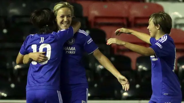 Gemma Davison (centre) celebrates a goal