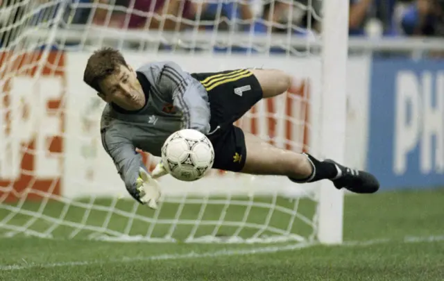 Packie Bonner saves a penalty against Romania to put the Republic of Ireland into the quarter-finals of the 1990 World Cup