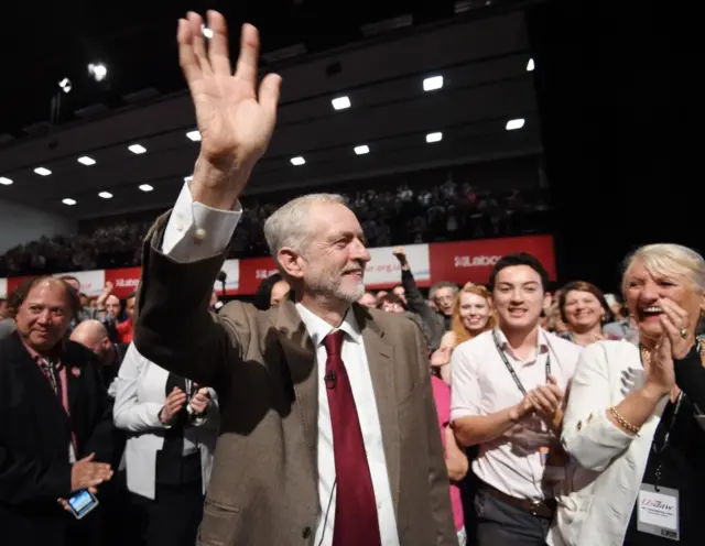 Jeremy Corbyn leaves the hall