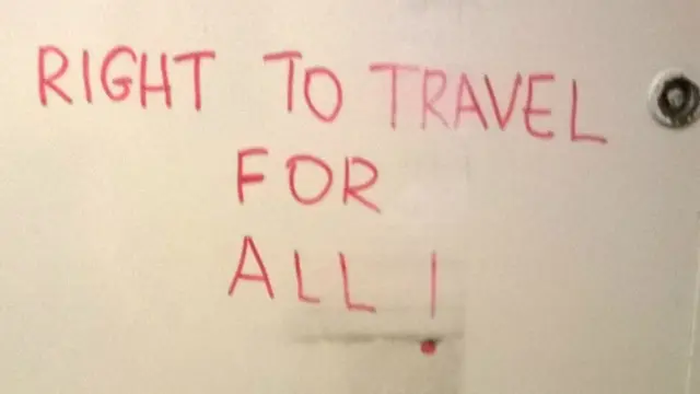 A message reading "Right to travel for all!" that was written on a train carrying migrants into Hungary - 2 September 2015