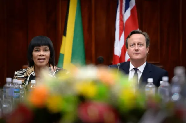 Portia Simpson Miller (left) and David Cameron