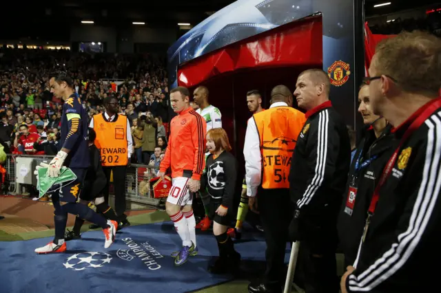 Manchester United enter the stadium