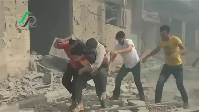 Screengrab from video posted online by opposition activist purportedly showing aftermath of Russian air strikes in Talbiseh, Homs province. 30 Sept 2015