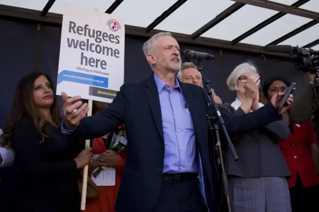 Jeremy Corbyn address a rally for refugees