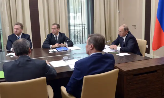 Vladimir Putin chairs a government meeting