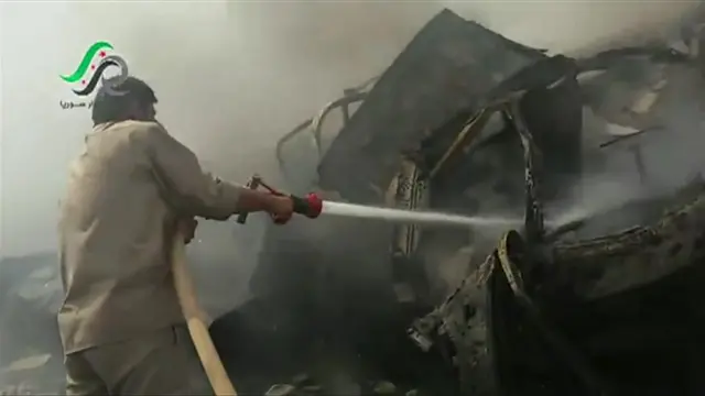 Screengrab from video posted online by opposition activist purportedly showing aftermath of Russian air strikes in Talbiseh, Homs province. 30 Sept 2015