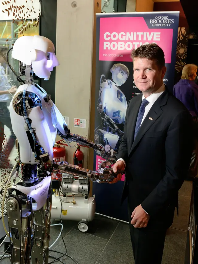 Artie the robot with US Ambassador Matthew W. Barzun
