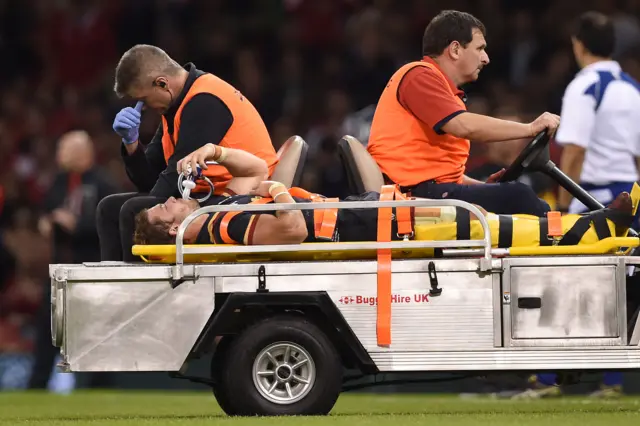 Leigh halfpenny is stretchered off