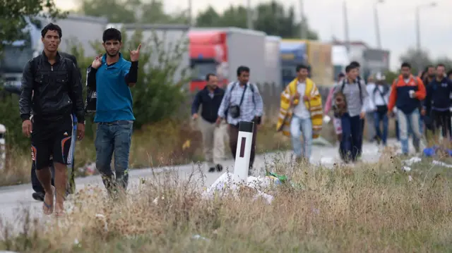 Migrants crossing from Hungary into Austria