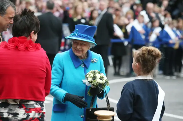 The Queen being greeted at Edinburgh Waverley station