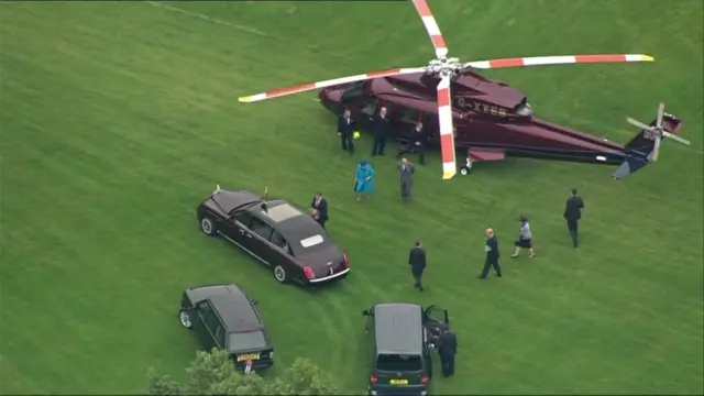Queen exiting helicopter