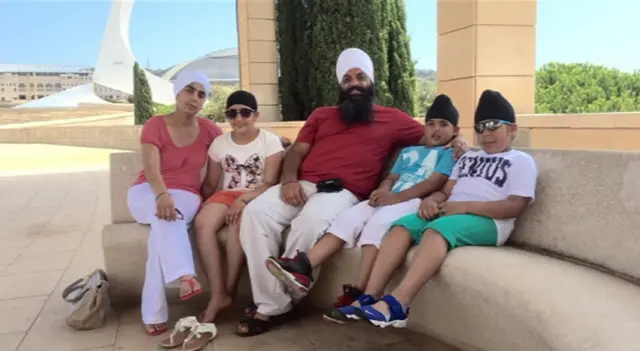 Paramjeet Singh Saini and wife and children
