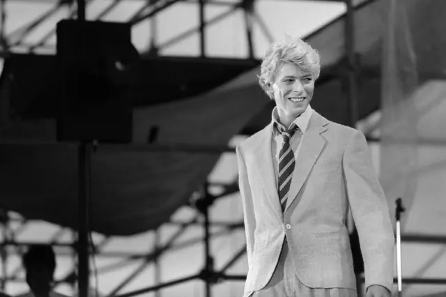 This file photo taken on June 9, 1983 shows British singer David Bowie performing on stage at the Auteuil"s Hippodrome in Paris.