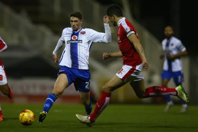 George Evans (L) of Walsall reaches the ball ahead of Raphael Rossi-Branco (R) of Swindon Townduring the Sky Bet League One match between Swindon Town and Walsall at the County Ground on November 24, 2015 in Swindon
