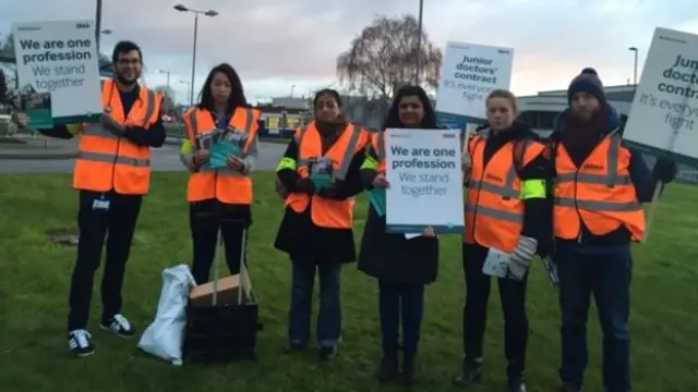 Junior doctors outside Birmigham's City Hospital including Christian Labib, pictured left