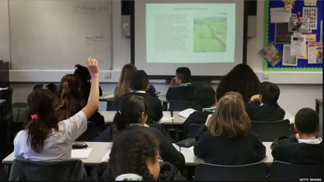 Schoolchildren in a classroom in London