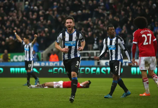 Paul Dummett celebrates