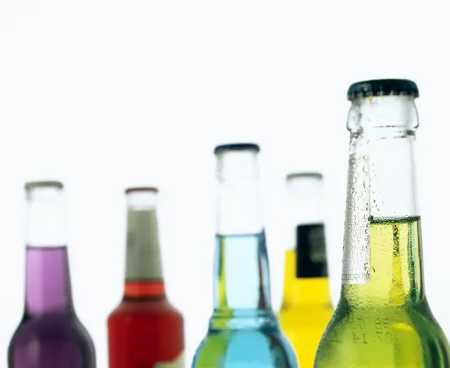 Colourful alcopop bottles.