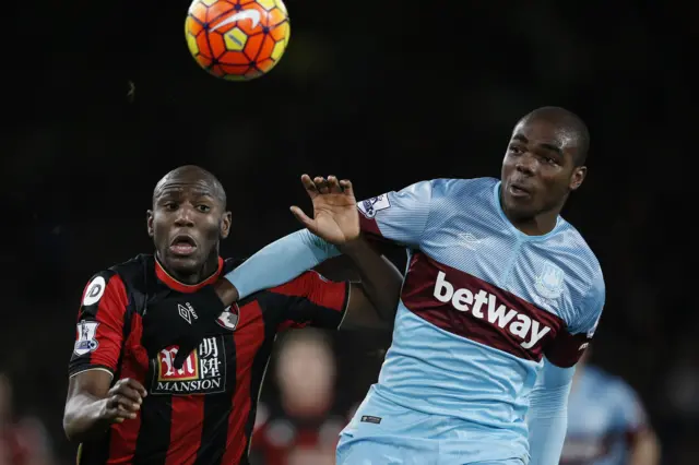 Benik Afobe vies with West Ham United defender Angelo Ogbonna