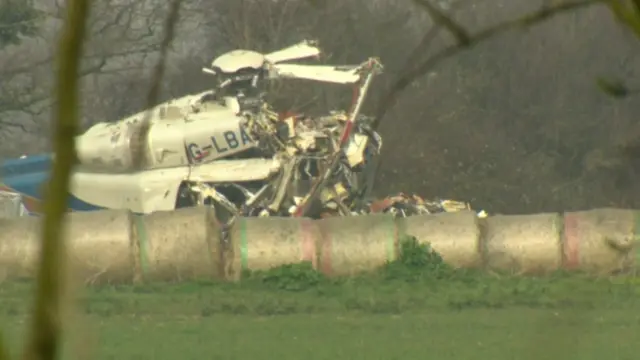 The wreckage of the helicopter crash