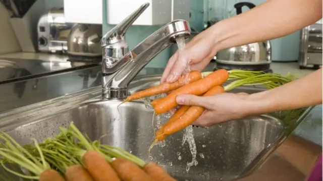 Generic carrots being washed