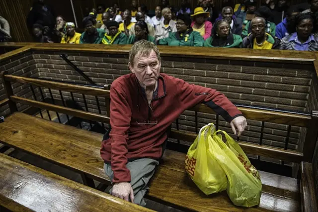 anish man living in South Africa, Peter Frederiksen sits in the accused dock ahead of his bail application at the Bloemfontein Magistrate's court on November 4, 2015