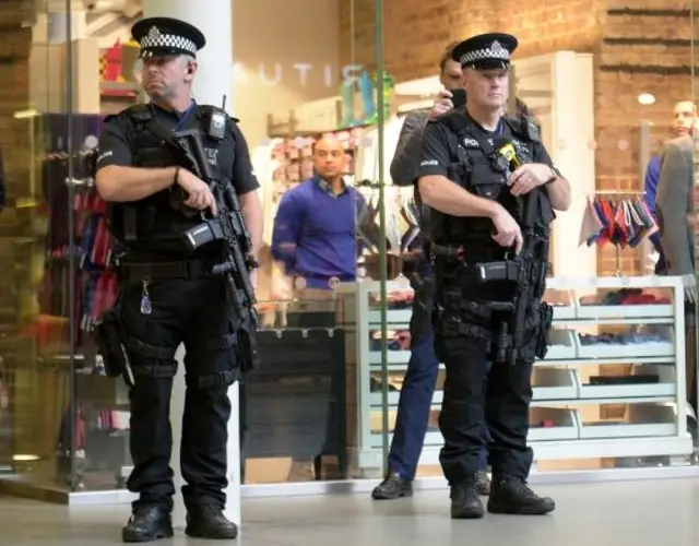 Armed police at St Pancras International Station in London