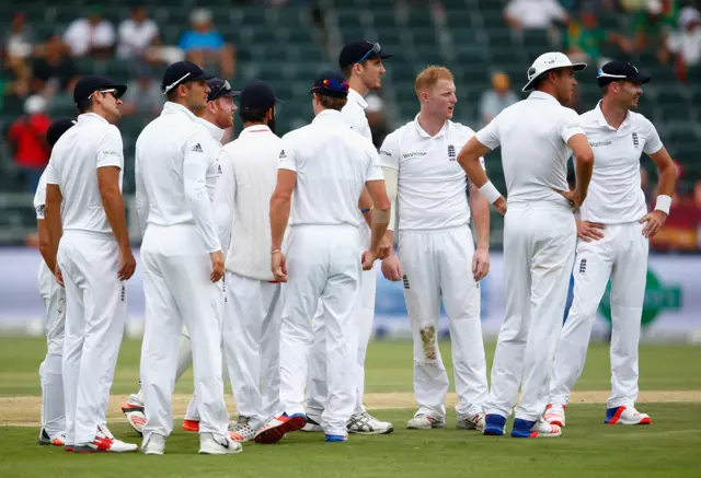 England's players wait for a review decision