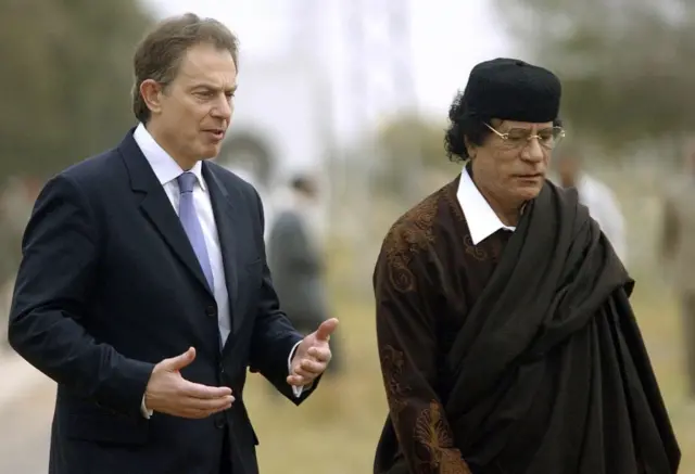 Tony Blair and former Libyan leader Muammar al-Gaddafi