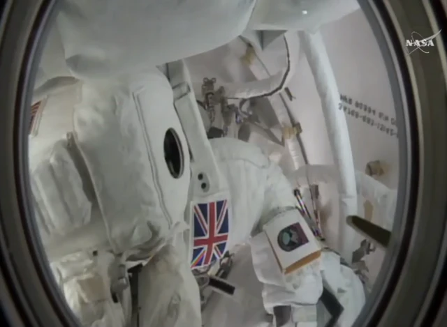 Tim Peake seen from inside the hatch