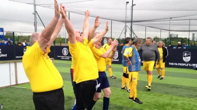 Condor FC celebrate winning the walking football final in the 2015 FA People's Cup