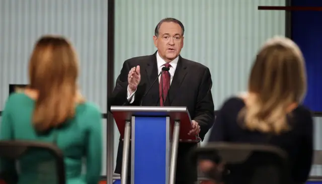 Republican presidential candidate, former Arkansas Gov. Mike Huckabee speaks during the Fox Business Network Republican presidential debate at the North Charleston Coliseum,