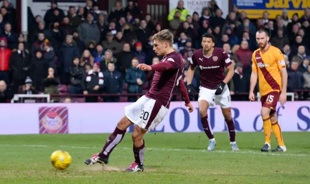 Gavin Reilly scores a penalty for Hearts against Motherwell