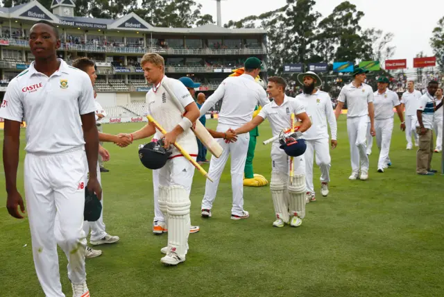 Teams shake hands