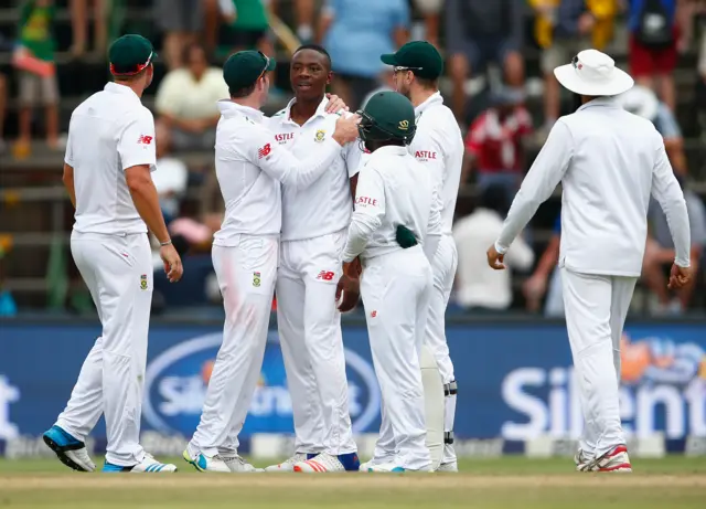 Kagiso Rabada of South Africa is congratulated after bowling out Stuart Broad