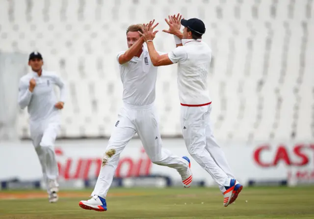 Stuart Broad of England celebrates with Nick Compton