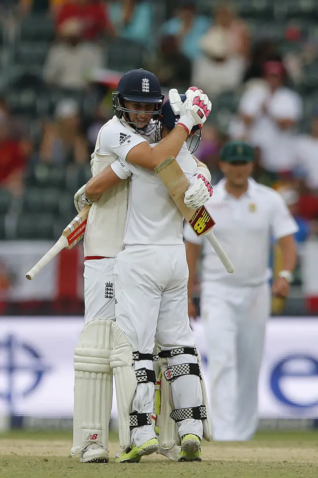 Joe Root and James Taylor congratulate each other