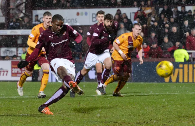 Arnaud Djoum scores a penalty for Hearts against Motherwell