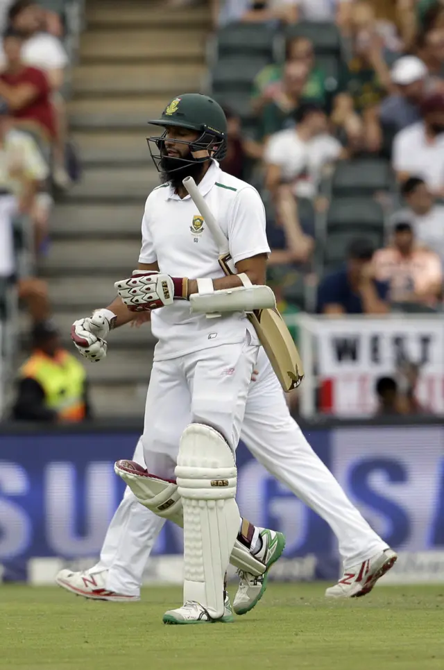 Hashim Amla leaves the field after being dismissed