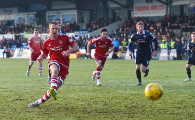 Adam Rooney scores a penalty for Aberdeen against Ross County