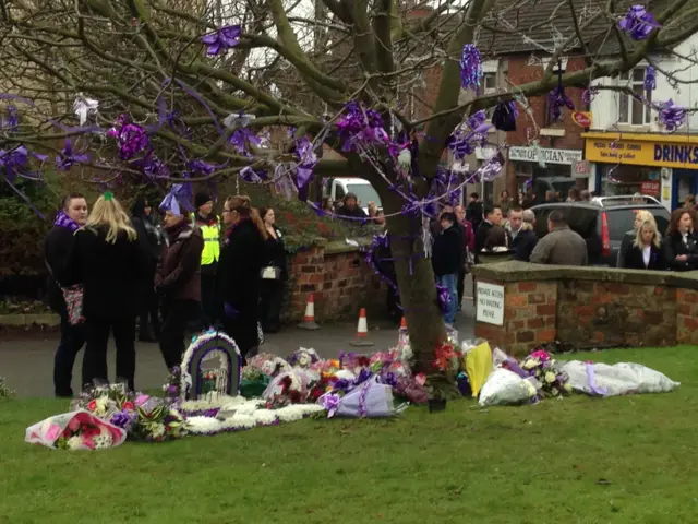 Floral tributes outside church